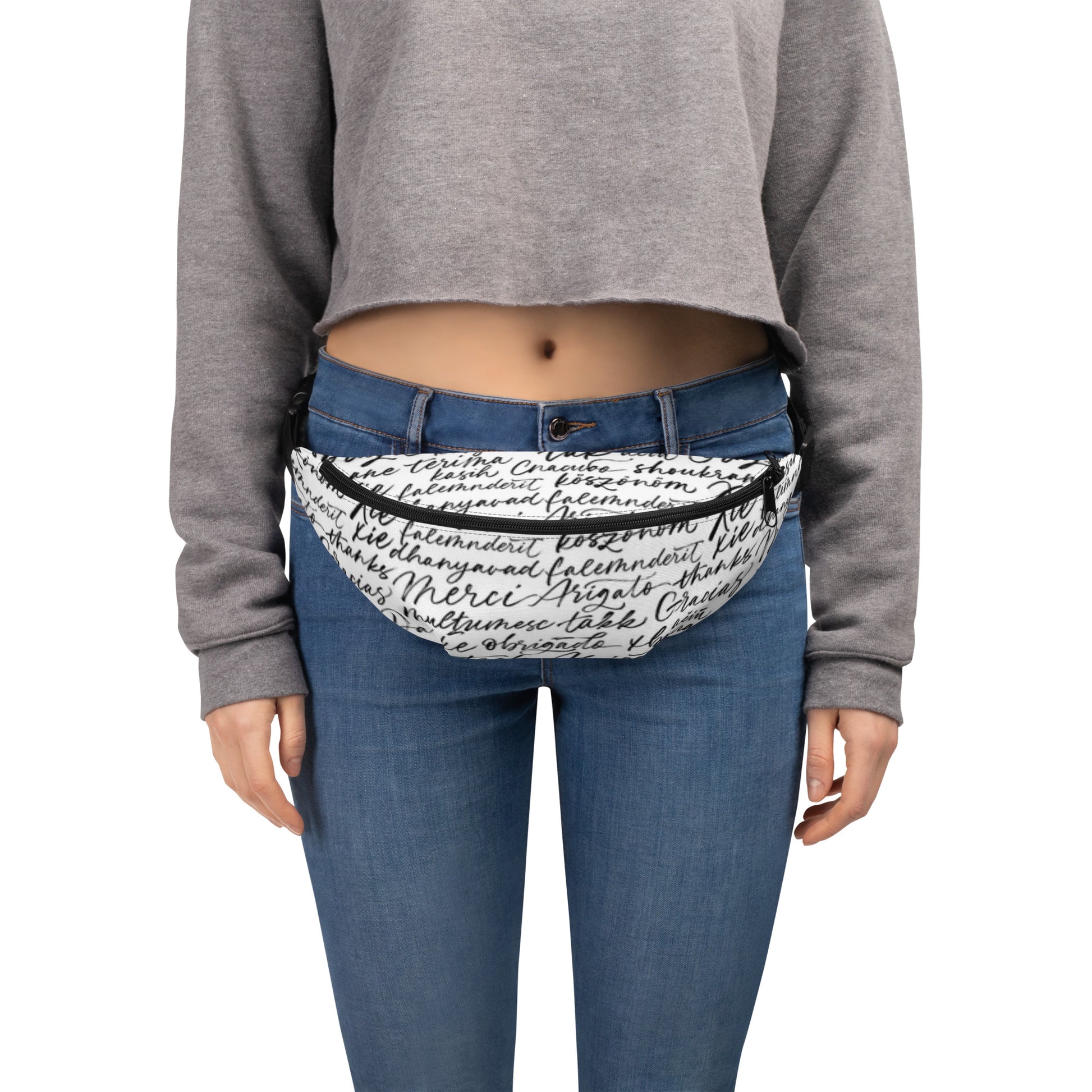 Stylish HFT Fanny Pack with adjustable black straps and a multilingual 'thank you' script pattern in a handwritten font on a white background, featuring a zippered compartment and a compact design front 