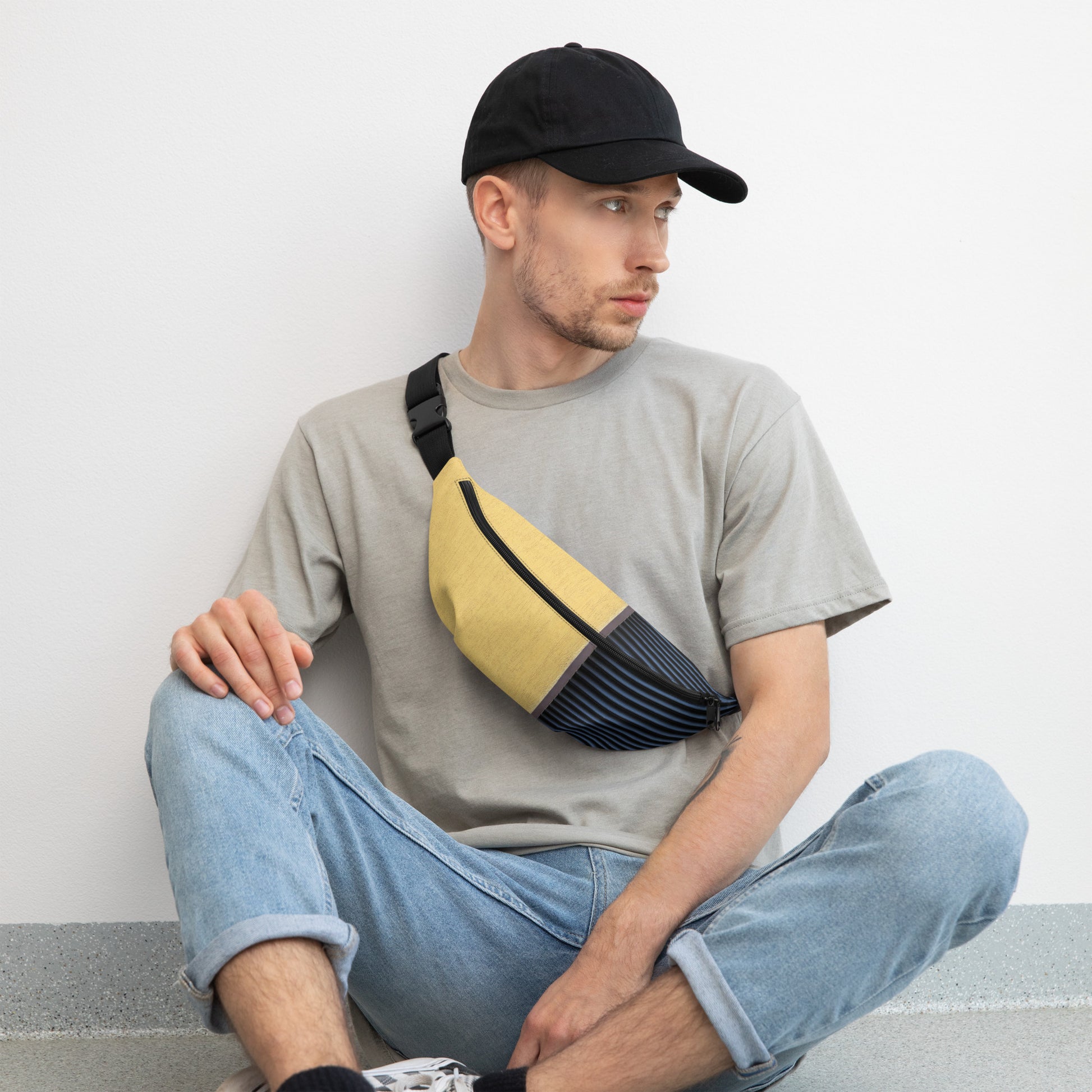 Stylish HFT Fanny Pack V with adjustable straps featuring a mustard-yellow canvas front, navy-blue pleated detail, and the HFT logo on the back front