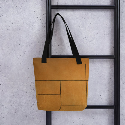 HFT Tote Bag I in a stylish camel brown color with black handles, hanging against a modern gray background, shows off its spacious design and external pocket detail