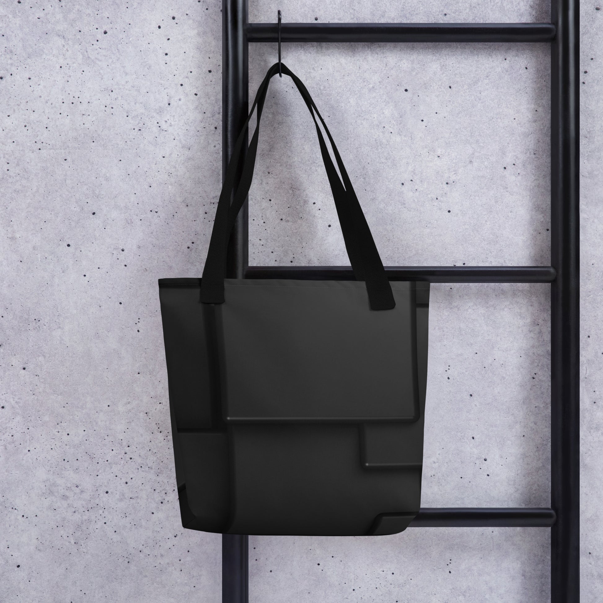 HFT Tote Bag hanging on a metal rack, featuring a sleek black design with spacious compartments, suitable for carrying a variety of items