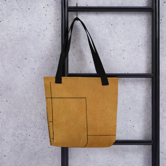 HFT Tote Bag II in a stylish camel brown color with black handles, hanging against a modern gray background, shows off its spacious design and external pocket detail