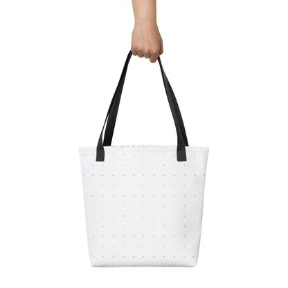 Person holding an HFT Tote Bag III, showcasing the bag's spacious and trendy design with a polka dot pattern against a WHITE background