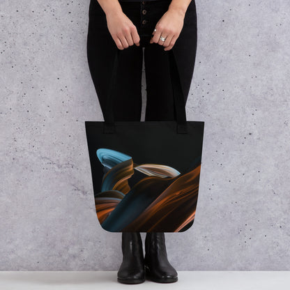 A person holding the HFT Tote Bag VI with an abstract artistic design in shades of blue and brown against a textured gray background.