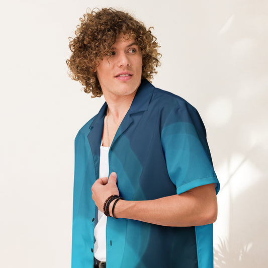 The HFT Unisex Button Shirt I in gradient shades of blue, designed with short sleeves and a sleek button-up front, made from lightweight, moisture-wicking fabric for ultimate summer comfort front right