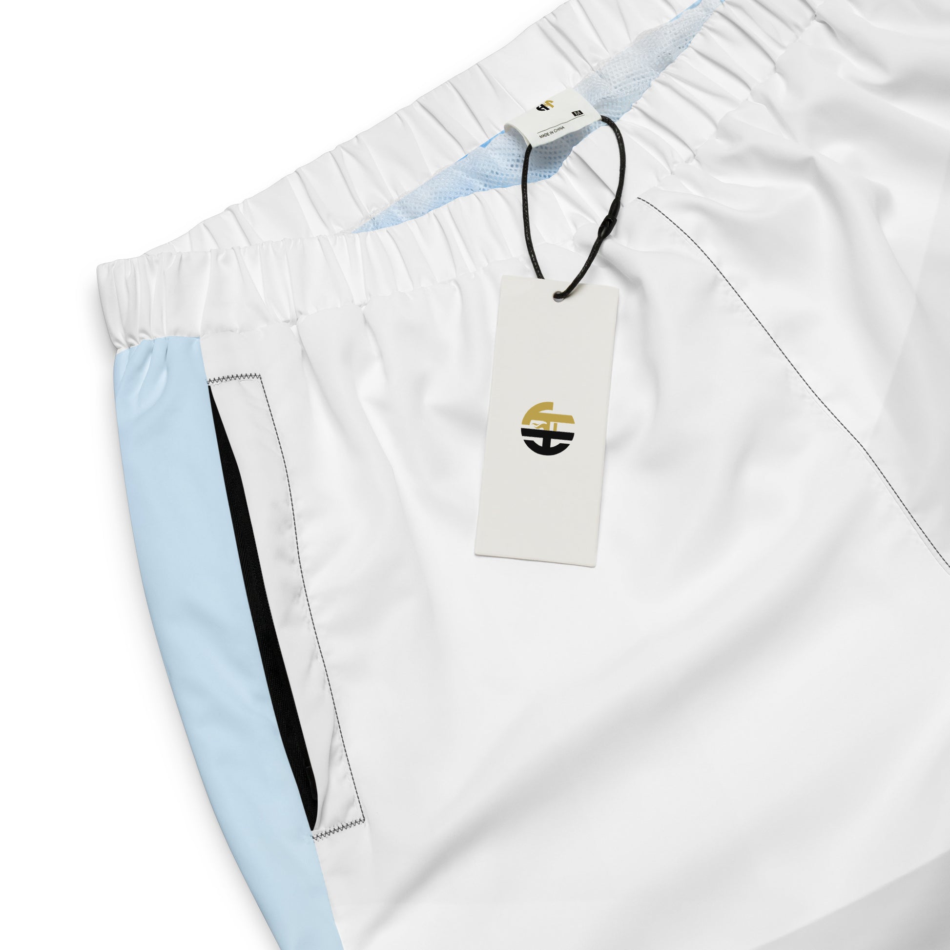 legant HFT Unisex Track Pants III in a color-block design with white and light blue panels, featuring water-resistant fabric, mesh lining, and elastic ankle cuffs product details