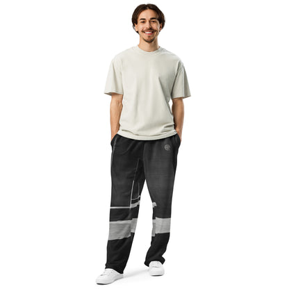 Funky '90s-inspired wide-leg joggers with all-over print, side pockets, and elastic waistband MALE