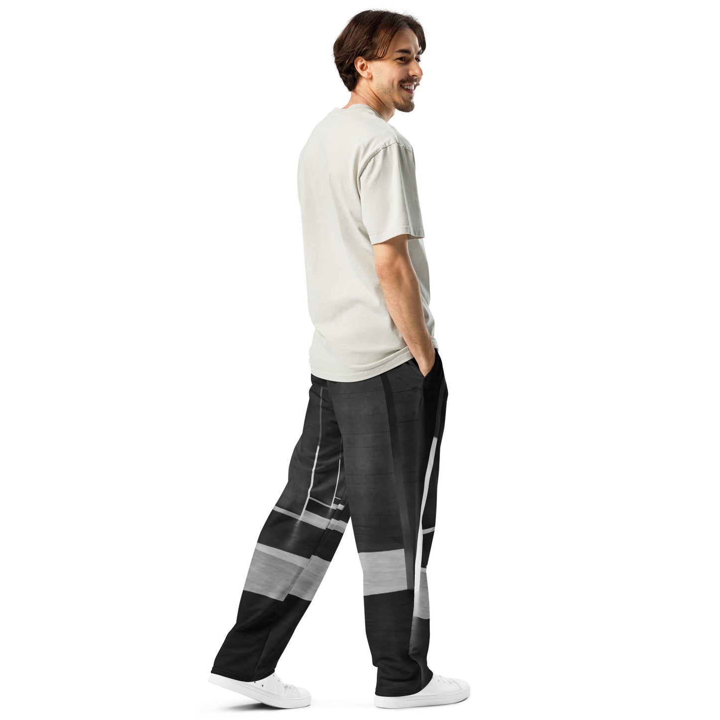 Funky '90s-inspired wide-leg joggers with all-over print, side pockets, and elastic waistband back