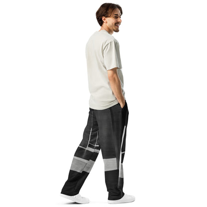 Funky '90s-inspired wide-leg joggers with all-over print, side pockets, and elastic waistband back