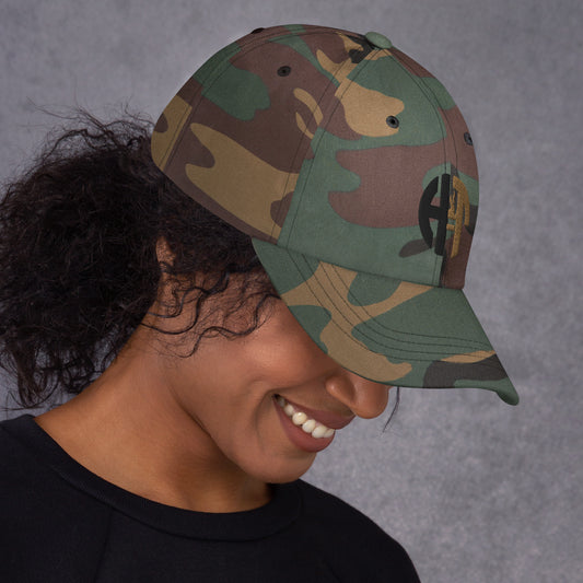 classic dad hat with a subtle, tonal embroidered logo on the front panel, featuring a curved brim and six-panel design green camo right view