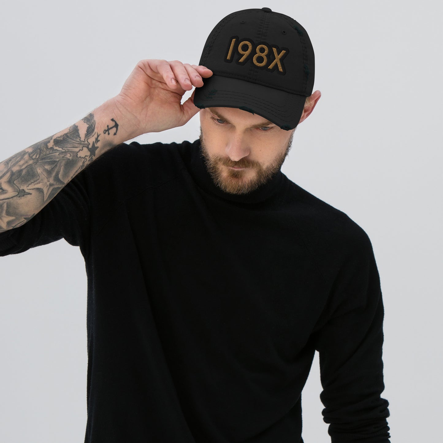 Unisex '198X' dad hat with a vintage distressed look on the brim and crown, featuring a contrasting HFT logo at the back black