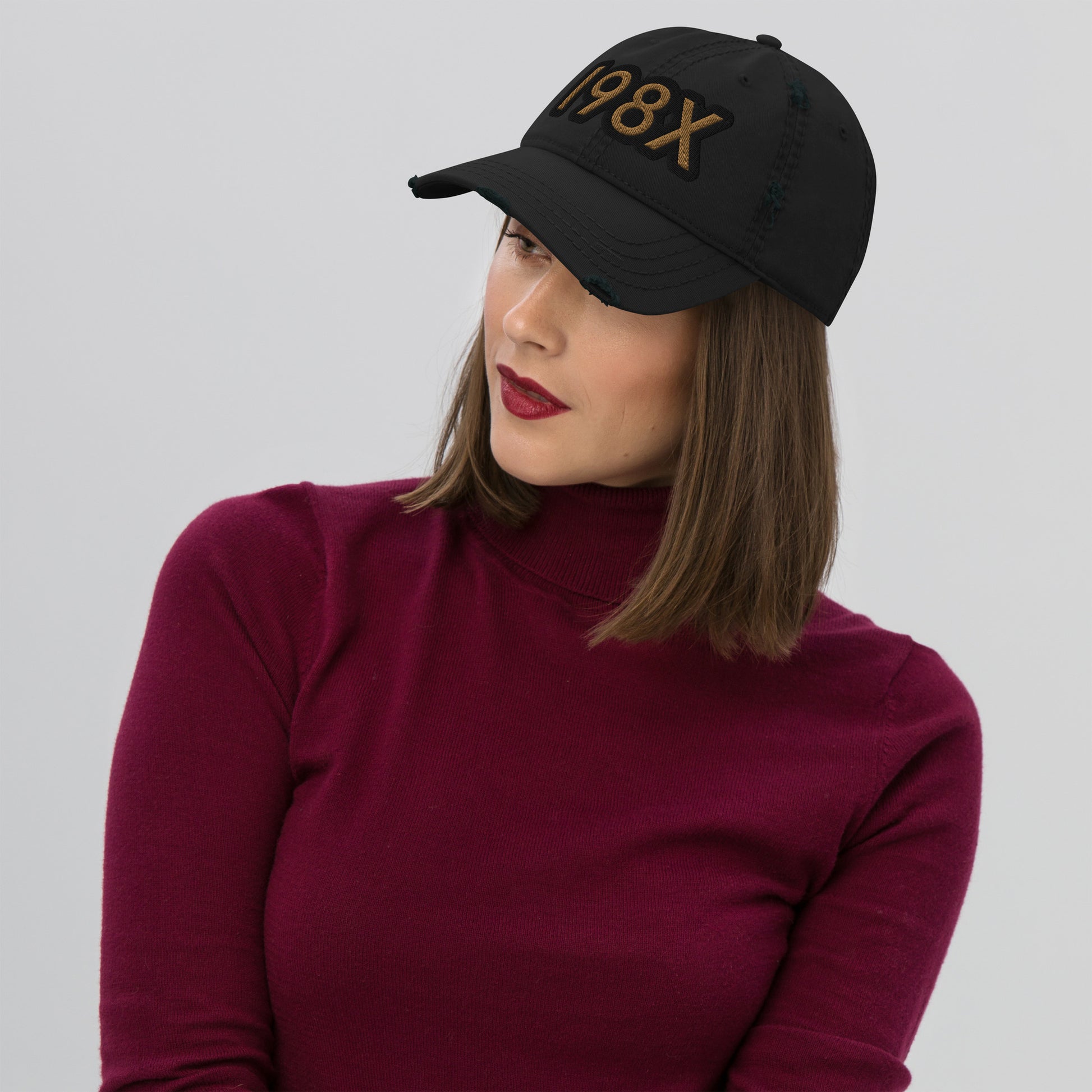 Unisex '198X' dad hat with a vintage distressed look on the brim and crown, featuring a contrasting HFT logo at the back black