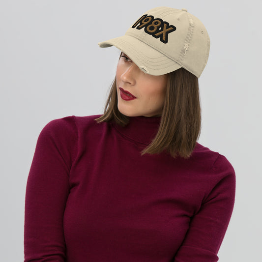 Unisex '198X' dad hat with a vintage distressed look on the brim and crown, featuring a contrasting HFT logo at the back