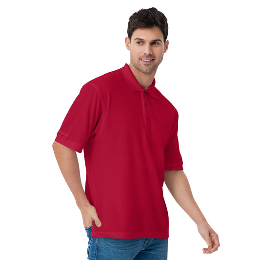 Port Authority Men's Premium Polo shirt in a relaxed fit, featuring a flat knit collar, metal buttons, and HFT store embroidery red front model male