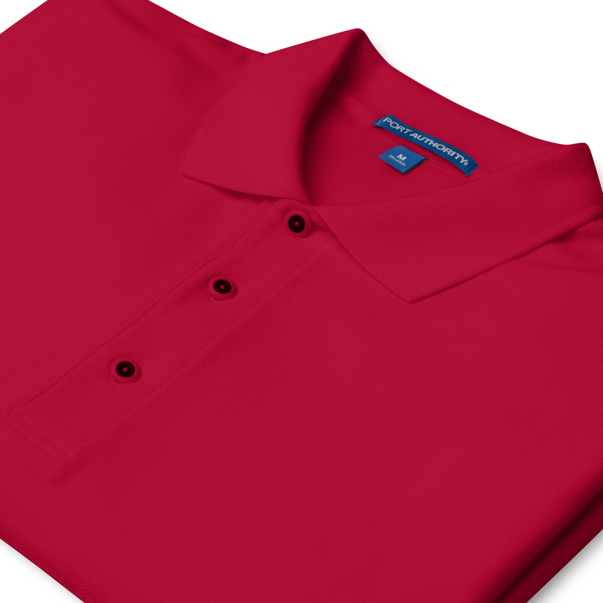 Port Authority Men's Premium Polo shirt in a relaxed fit, featuring a flat knit collar, metal buttons, and HFT store embroidery red front  detail collar