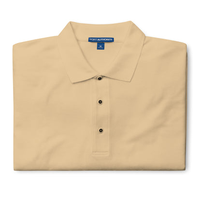 Port Authority Men's Premium Polo shirt in a relaxed fit, featuring a flat knit collar, metal buttons, and HFT store embroidery. stone front