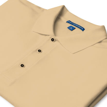 Port Authority Men's Premium Polo shirt in a relaxed fit, featuring a flat knit collar, metal buttons, and HFT store embroidery  stone front collar details