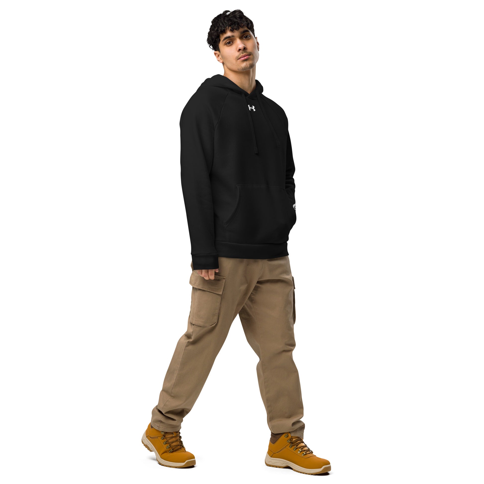 man wearing a  black HFT Under Armour® Hoodie with a relaxed fit, showcasing comfort and a subtle logo, perfect for casual or active wear