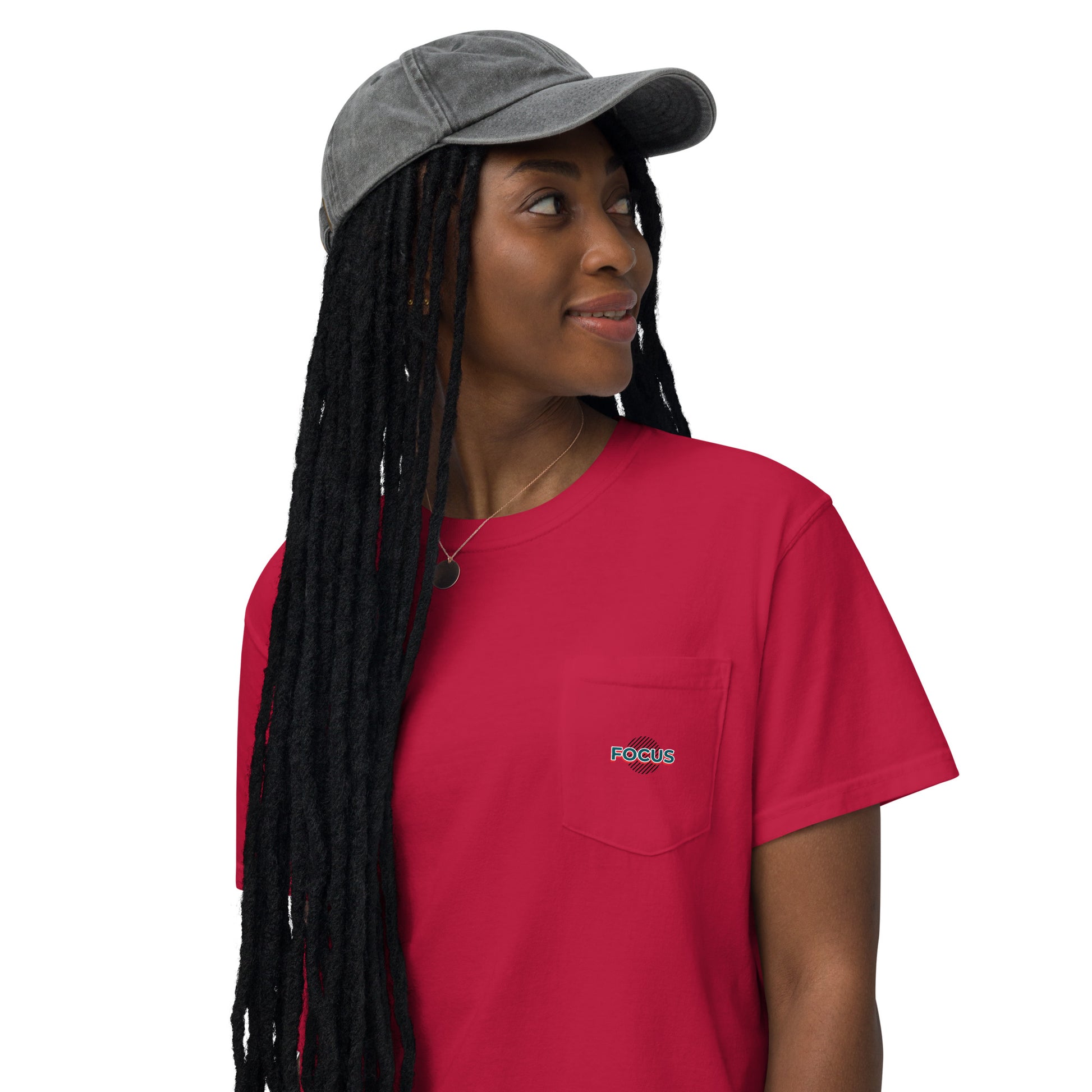 Person wearing the HFT Unisex Garment-Dyed Pocket T-shirt featuring a distinctive peace-sign hand graphic and the word 'p.e.a.c.e' printed on the back red